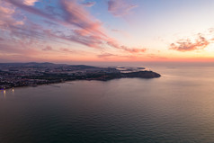 海边夕阳晚霞日落山东蓬莱航拍摄影图