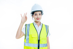 戴着安全帽拿着图纸的女工程师建筑师设计师