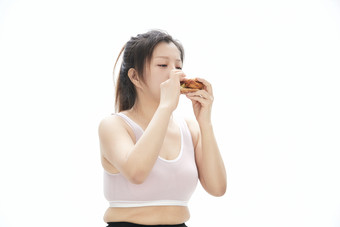 因暴饮暴食导致身材走样的亚洲女士