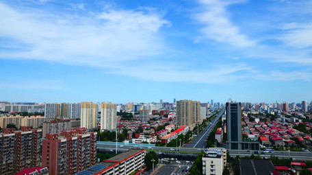 城市高楼蓝天白云车流延时摄影商场购物高清