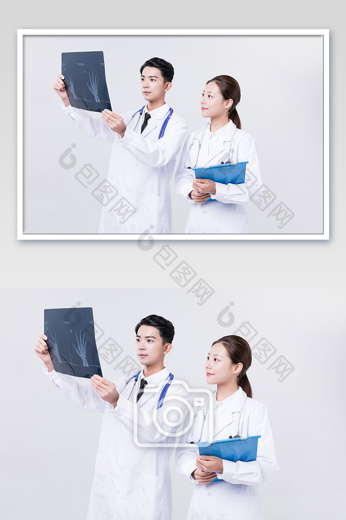 男女医生观察X光片摄影图片图片