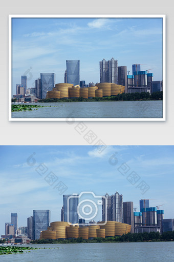 蓝天白云下现代城市建筑湖泊摄影图图片