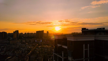 唯美城市夕阳火烧云日落延时摄影