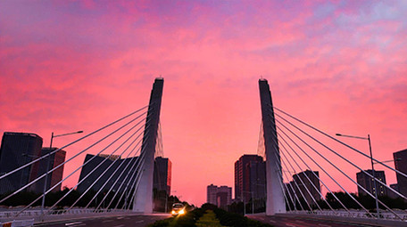 唯美郑州龙子湖日出彩霞地面航拍延时素材