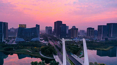 唯美郑州龙子湖日出彩霞地面航拍延时素材