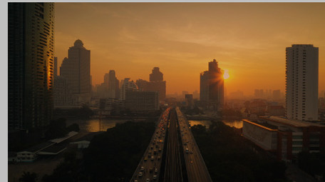 日出城市风光无人机航拍城市旅游