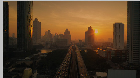 日出城市风光无人机航拍城市旅游