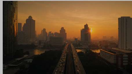 日出城市风光无人机航拍城市旅游