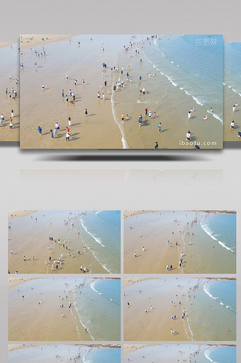 4K航拍海滨沙滩游客海浪浪花图片