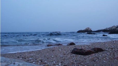 海滩沙滩石子海边海浪波浪海岸自然海洋实拍