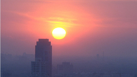 自然天空延迟摄影唯美日出城市朦胧