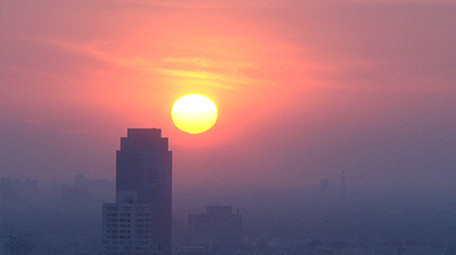 自然天空延迟摄影唯美日出城市朦胧