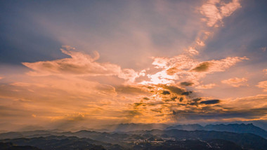 自然<strong>天空</strong>航拍山峰晚霞耶稣光实拍视频