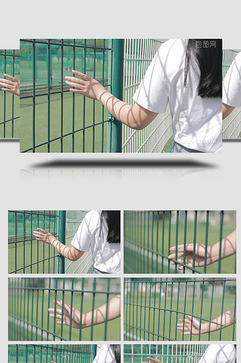 青春校园学生手抚摸栏杆4K实拍图片