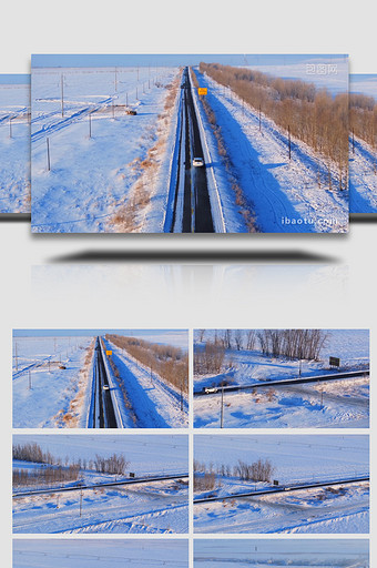 冬天冰雪农田公路行驶的汽车航拍图片