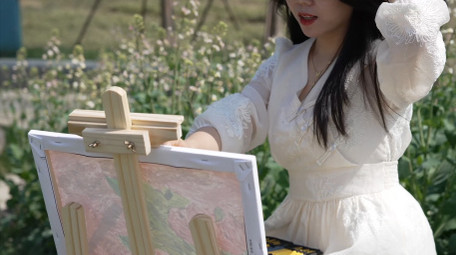 唯美春天人像女孩在户外写生实拍