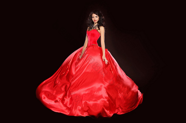 美丽的女人穿着华丽红色礼服上孤立的 bla