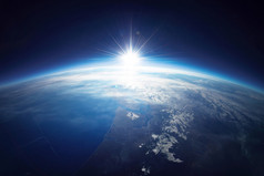 地球从日出的空间。这幅图像由美国国家航空航天局提供的元素