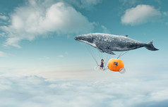 whale with pumpkin and two girls over clouds