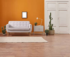 橙色墙壁和灰色沙发, 带植物的室内.