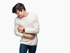 年轻的帅哥戴眼镜在孤立的背景与手在胃部, 因为恶心, 疼痛的疾病感到不适。ache 概念.