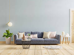 现代室内设计，沙发在空旷的蓝色墙壁背景。 3D渲染