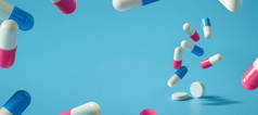 药物或药物，药丸和抗生素背景蓝色背景的文字空间