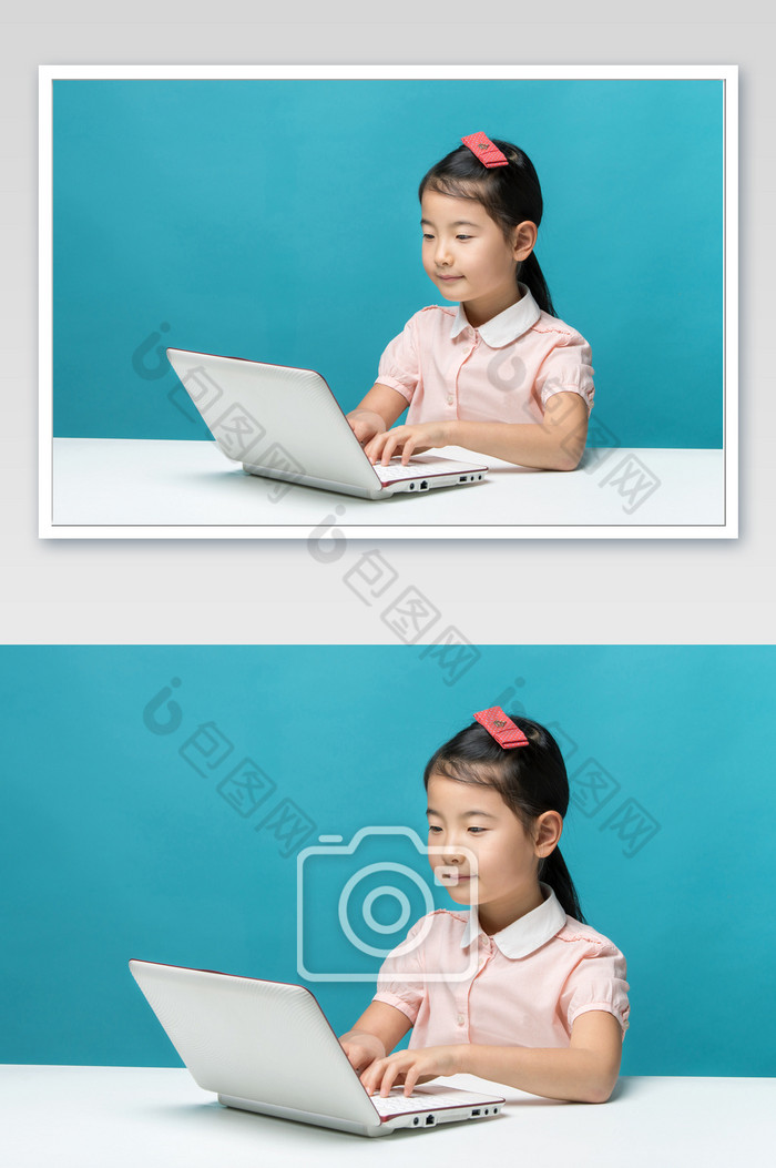 使用电脑的穿粉色衣服的小女孩图片图片