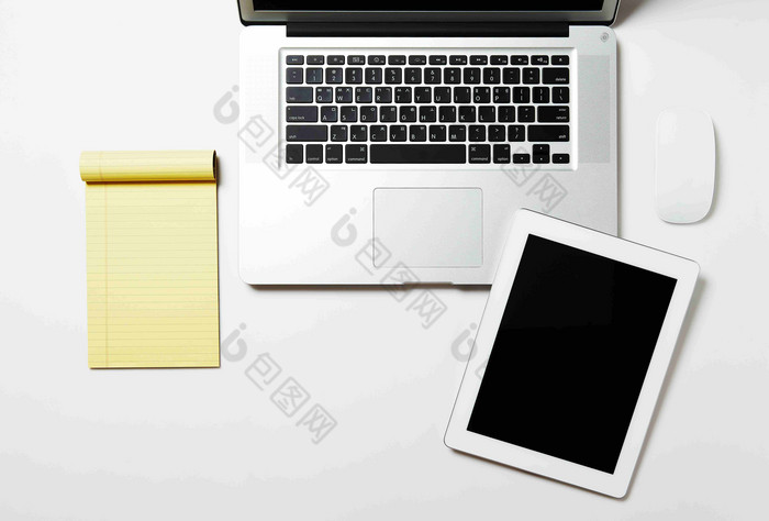 办公用品笔记本鼠标平板电脑道具摄影图