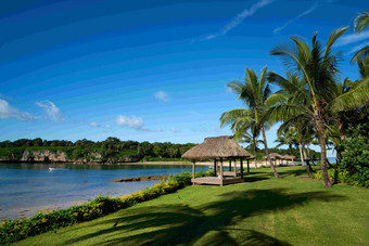斐济岛沙滩海岸小屋度假胜地风景摄影图