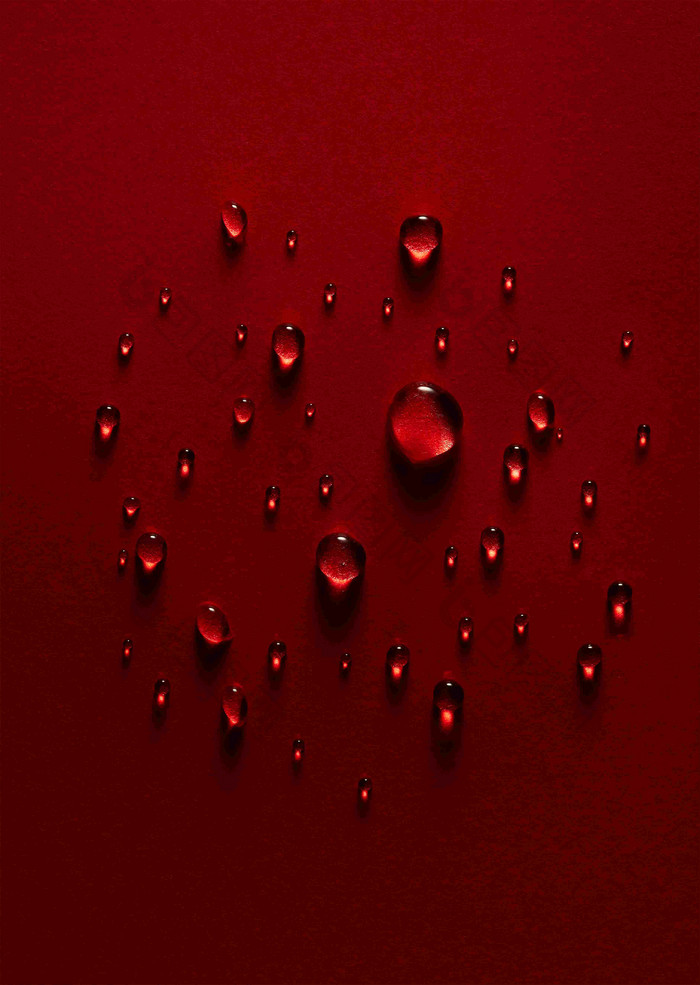 红色背景滴落的水珠广告素材摄影图