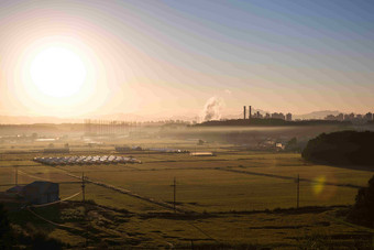 落日阳光洒满大地农业风景摄影图