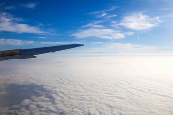 翱翔云翼飞机云海风景摄影图