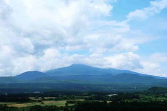 济州岛火山蓝天风景摄影图