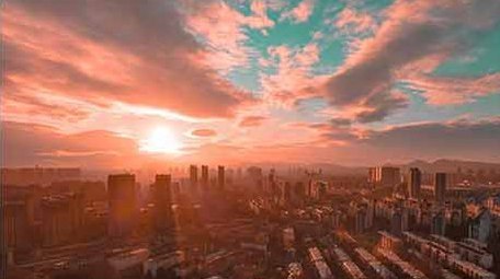 4K航拍城市夕阳落日余晖延时摄影青橙色调