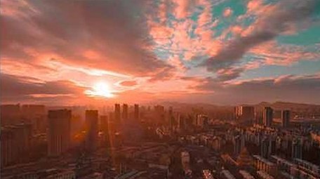 4K航拍城市夕阳落日余晖延时摄影青橙色调