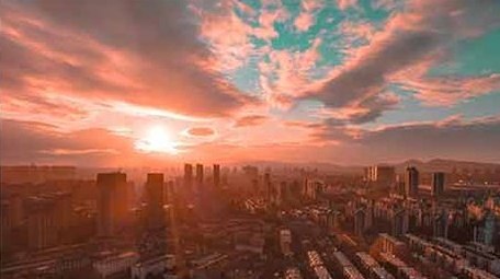 4K航拍城市夕阳落日余晖延时摄影青橙色调