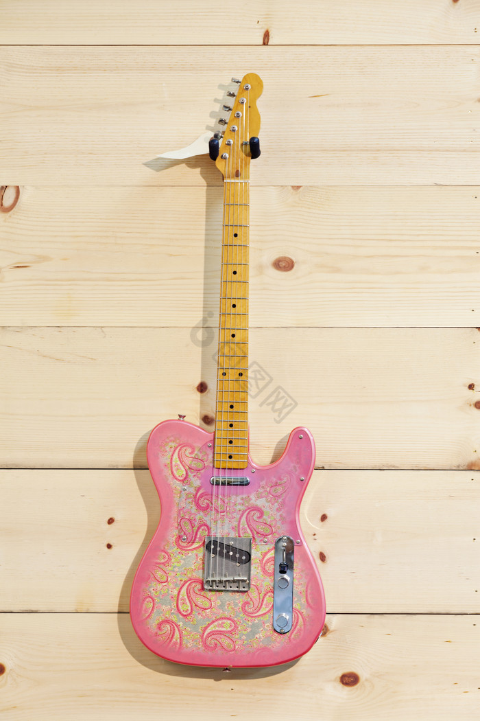 粉色乐器吉他摄影图