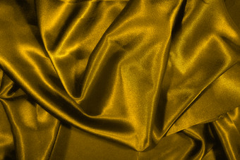 金色调光滑丝绸摄影图