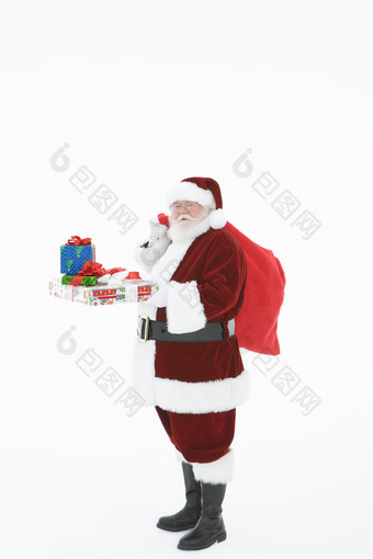 暗色调送礼物的圣诞老人摄影图
