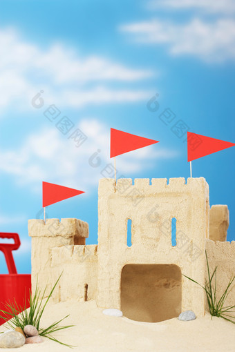 清新用沙子堆起的城堡摄影图