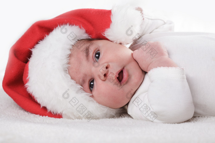 戴圣诞帽的宝宝摄影图