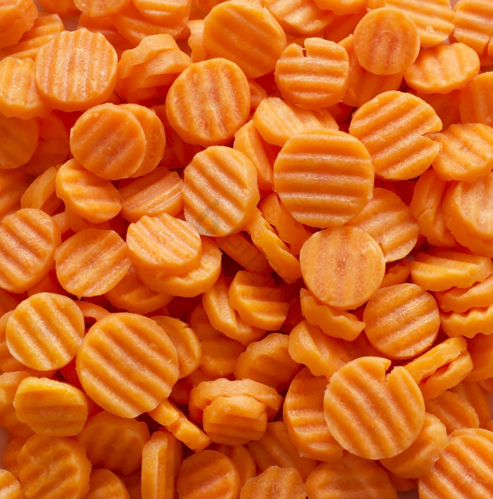 橙色调胡萝卜小吃摄影图