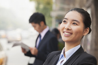 长发女人美女侧脸微笑城市白领<strong>摄影图</strong>