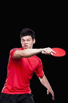 年轻男子打乒乓球运动员体育红色衣服