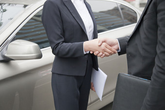 汽车合作团结握手商务业务工作服务谈判男女