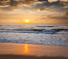 壮观的海边日落摄影图片