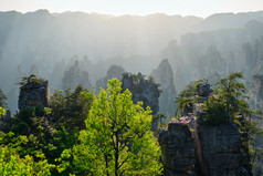 阳光群山远景摄影图片