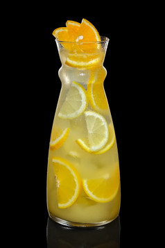 玻璃瓶橙汁饮品摄影图