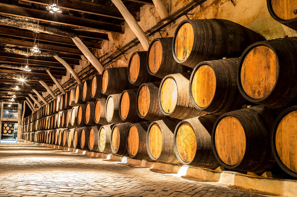 Barrels in  wine cellar in Porto